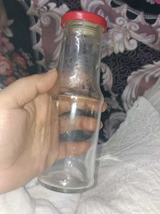 Glass Bottle with Red Lid