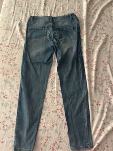 Distressed Blue Denim Jeans