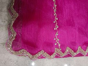Vibrant Pink Saree with Intricate Embellishments