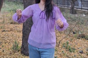 women dark levender color top with dobby print