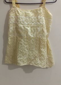Sleeveless Peplum Top