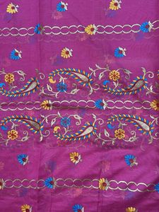 Pink embroidered fabric.