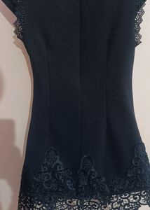 Designer Black Top With Pearls Work On Neck.