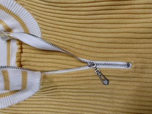 Sleeveless Ribbed Knit Zip Polo Top