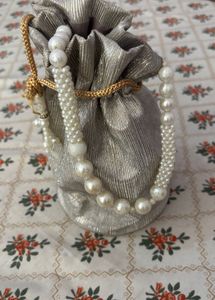 Elegant Pearl Embellished Potli Bag