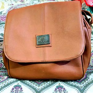 Stylish Brown Leather Crossbody Bag with compartme