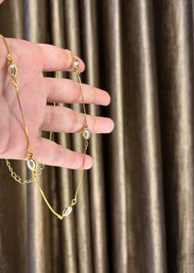 Elegant Gold Necklace with Oval pearl Gems