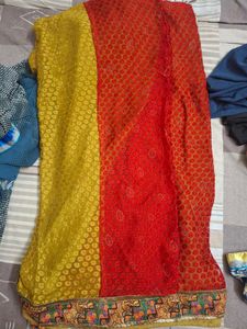 Yellow &amp; Red Saree with Embossed Pattern