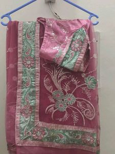 beautiful light magenta saree with stich blows and