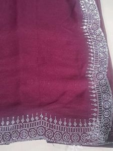 Elegant Maroon Saree with Silver Embellishments