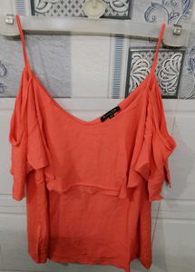 Coral coloured chic and elegant top