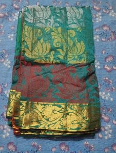 Elegant Teal & Maroon Saree with Gold Border