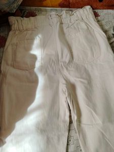 A New White Denim Jeans With Pockets.