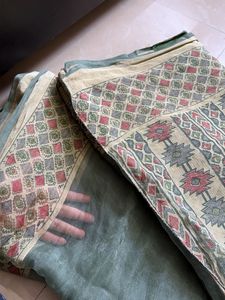 Elegant Green Saree with Geometric Border