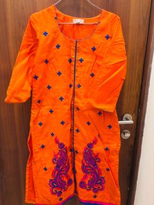 Vibrant Orange Kurta Set with Peacock Embroidery