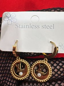 Gold Tone Hoop Earrings with Crystal Accent