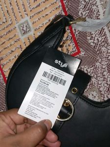 Chic Black Hobo Bag with Gold Accent