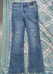 Ripped bellbottom jeans