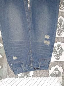 Distressed Wide Leg Denim Jeans