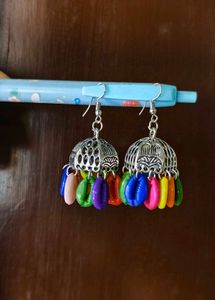 Traditional Gold Jhumka Earrings with Black Beads