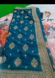 Elegant Teal Embroidered Silk Saree