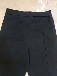 Chic Black High-Waisted Trousers with blue top