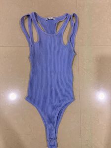 blue cutout body suit