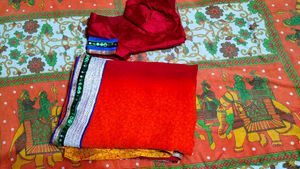 Red Saree with Embellished Blouse