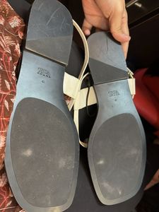 White Flat Sandals with Silver Detail