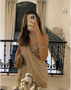 Elegant Beige Embellished Saree