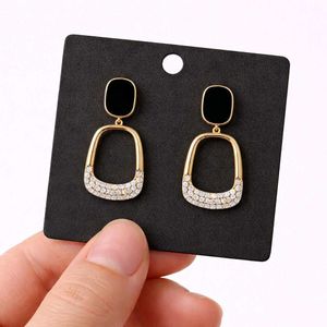 Elegant Gold &amp; Black Drop Earrings