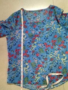 Blue floral ditsy- print top. (Material: Not sure)