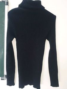 Classic Black Ribbed Turtleneck Sweater