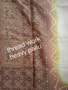 Elegant Off-White Saree with Bandhani Print