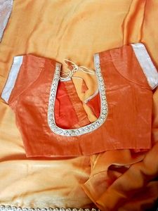Elegant Orange saree with Embellishments