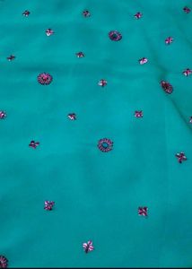 Teal Saree with Floral Embellishments