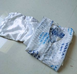 Elegant White Blue Leaf Print net Kurta Set