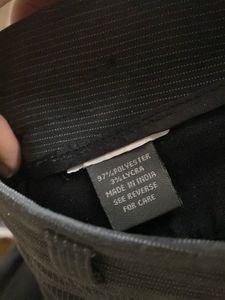 dark grey striped trousers