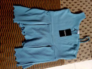 Blue Asymmetrical Ruffled Peplum Top