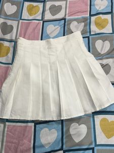 white mini pleated skirt