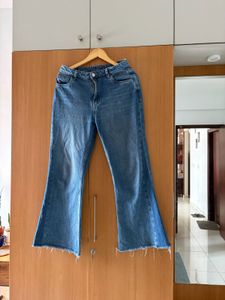 Nuon Flared Denim Jeans with Frayed Hem