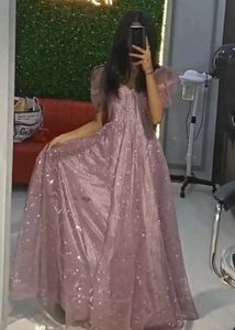 The back features a high neckline with