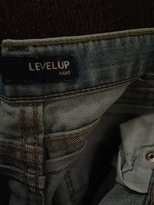 Distressed Blue Denim Jeans