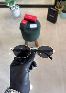 prada Sunglasses - Gold Frame