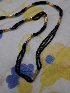 Elegant Beaded Necklace with Gold Pendant