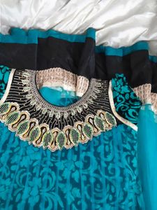 Stunning Teal Ethnic Gown with 2 inch margin