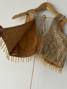 Embellished V-Neck Sleeveless Blouse