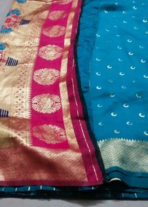 Beautiful Teal Saree with Pink Border