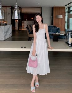 Elegant White Sundress with Spaghetti Straps