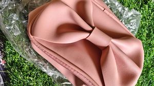 Smytten Bow Clutch Bag